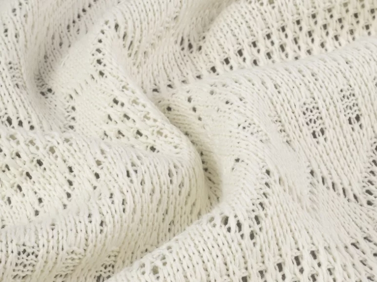 Трикотаж вязанный ажурный молочный