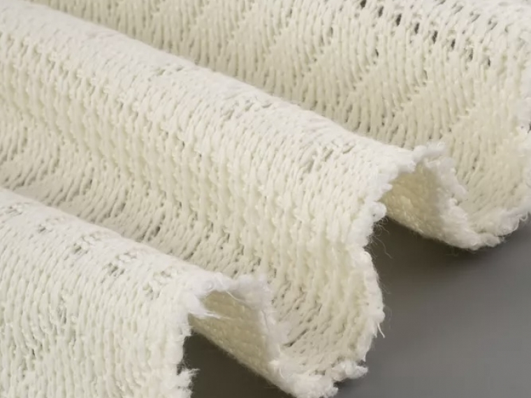 Трикотаж вязанный ажурный молочный