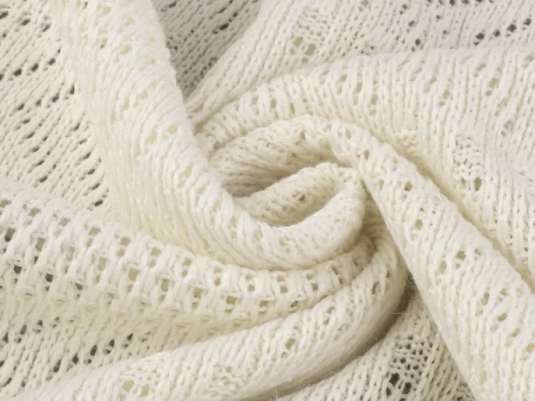 Трикотаж вязанный ажурный молочный
