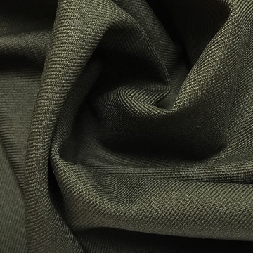 Костюмная ткань с шерстью зеленая
