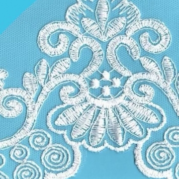 Вышивка на сетке экрю шир. 14 см