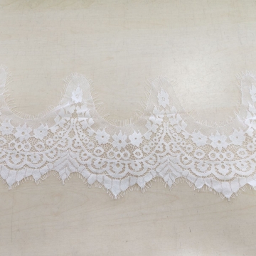 Вышивка на сетке экрю шир. 14 см