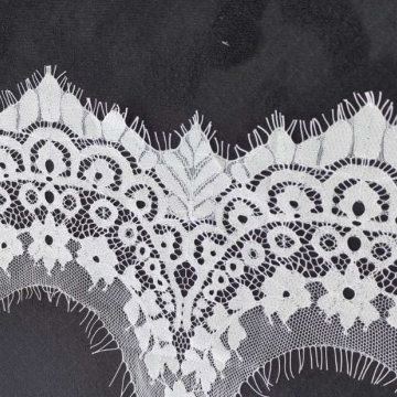 Вышивка на сетке экрю шир. 14 см